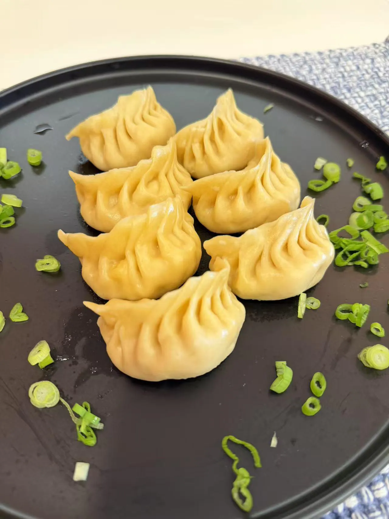 Pumpkin-infused yellow pork steamed dumplings at Dumpling Station, a Chinese Restaurant in Delaware