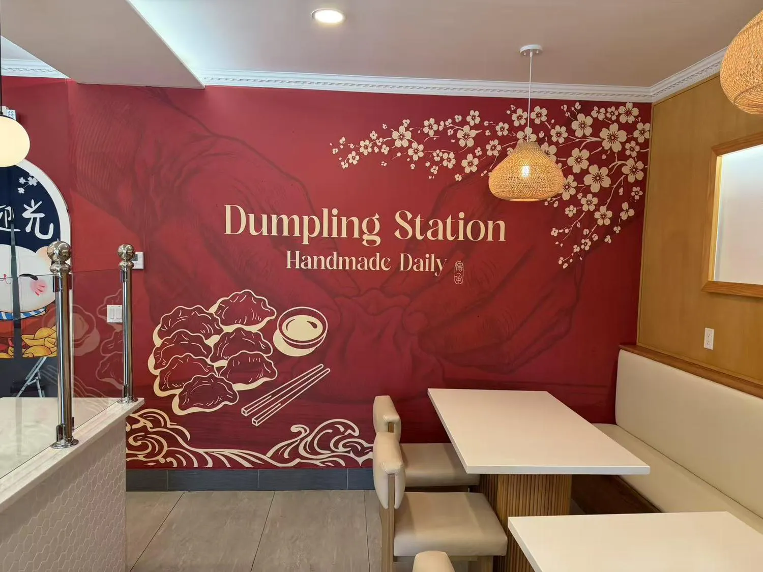 Dumpling Station branded wall mural in the dining area at Dumpling Station, a Chinese Restaurant in Delaware