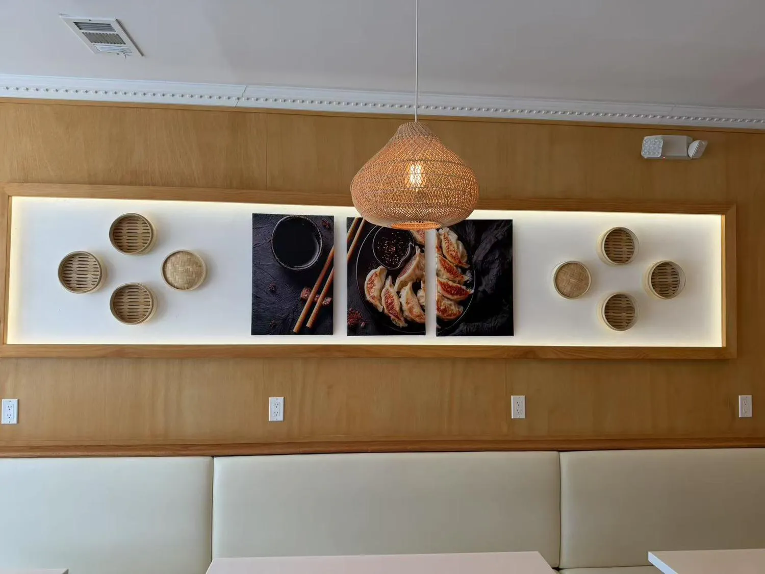 Restaurant dining area with dumpling decor at Dumpling Station, a Chinese Restaurant in Delaware